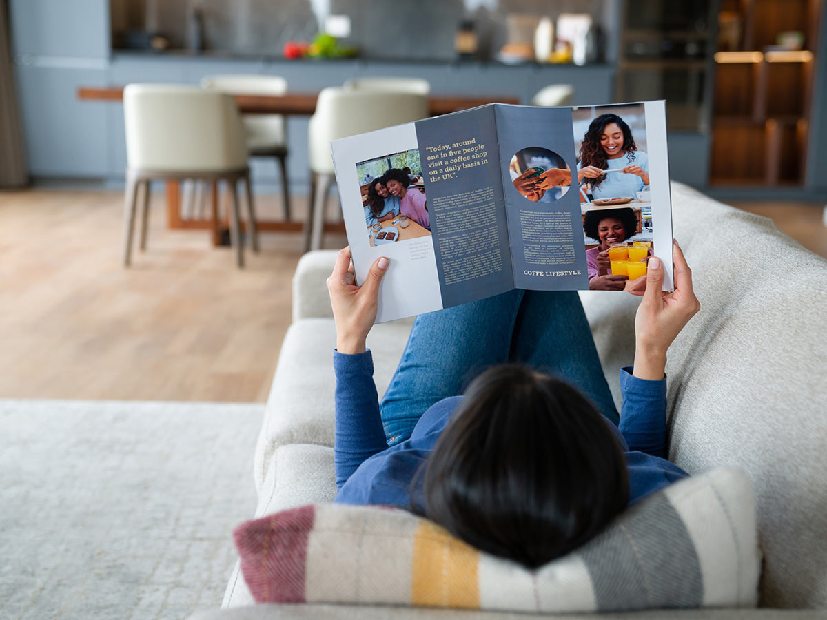 woman reading magazine