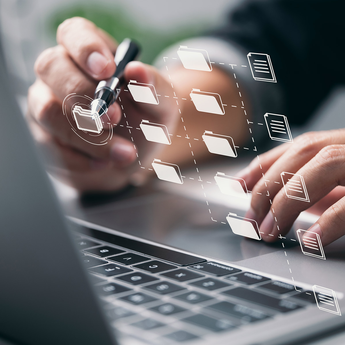 Hand touching screen display of folders